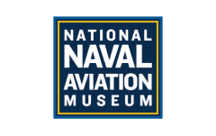 A navy museum logo with the words national naval aviation museum underneath.